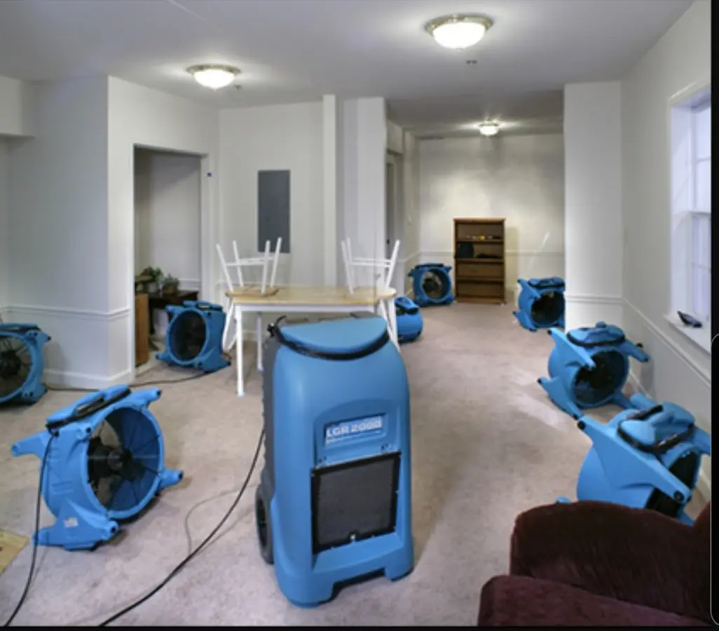 Air movers and dehumidifier setup for Water Damage Restoration in Willowick